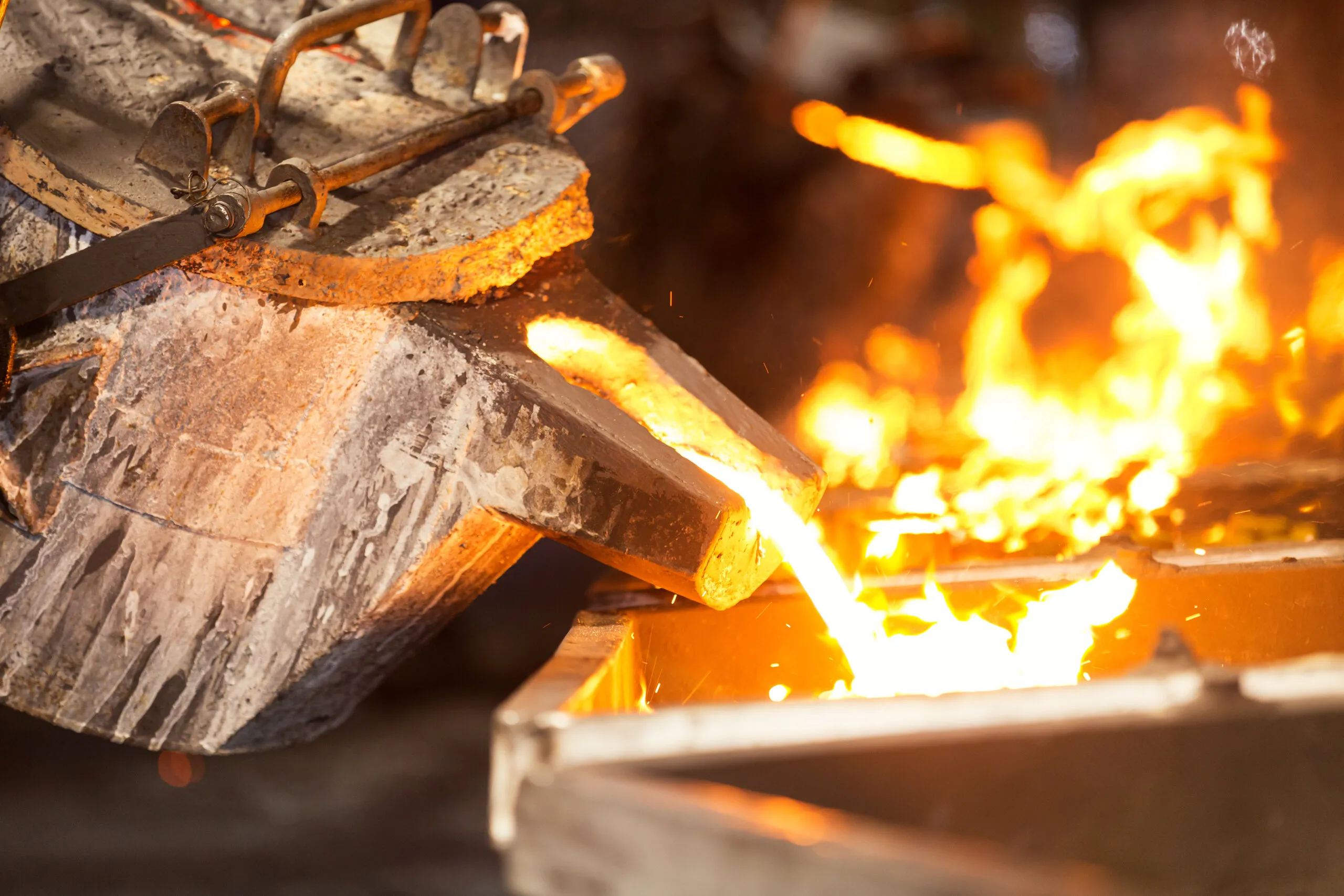 Molten metal poured from a crucible