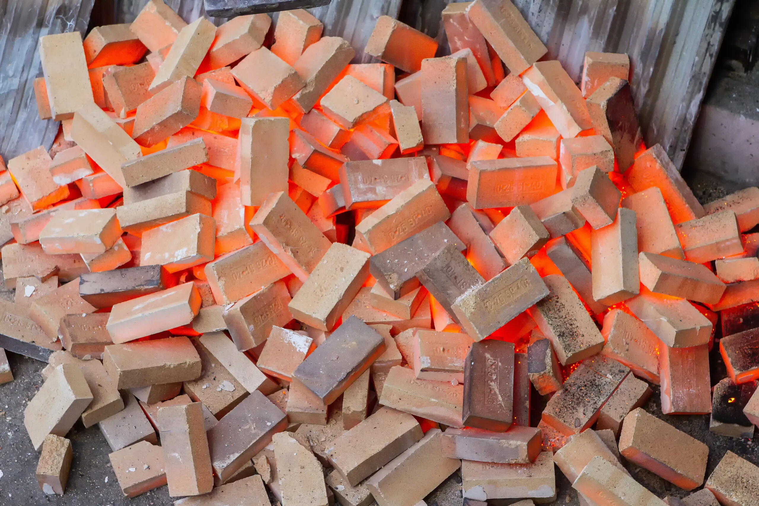 Glowing hot refractory bricks